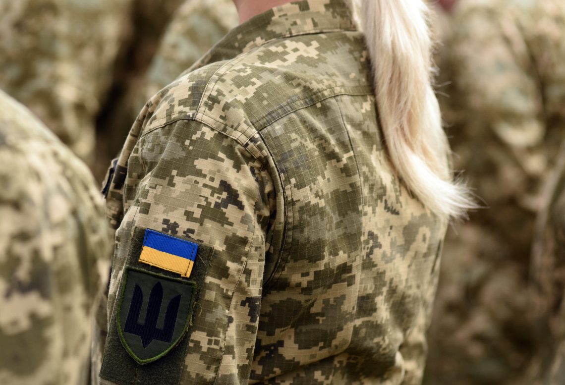 Woman soldier. Woman in army. Ukraine military uniform. Ukrainia