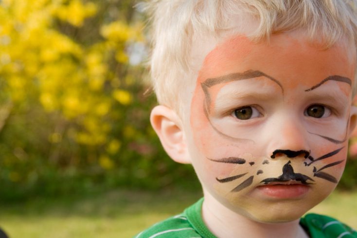 Face paint tiger boy child © Depositphotos