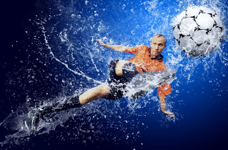 Water drops around football player under water on blue backgroun © Depositphotos