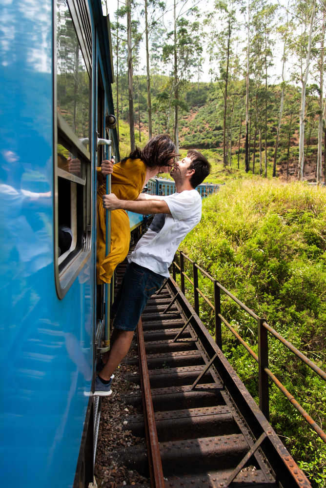stock photo couple kissing train