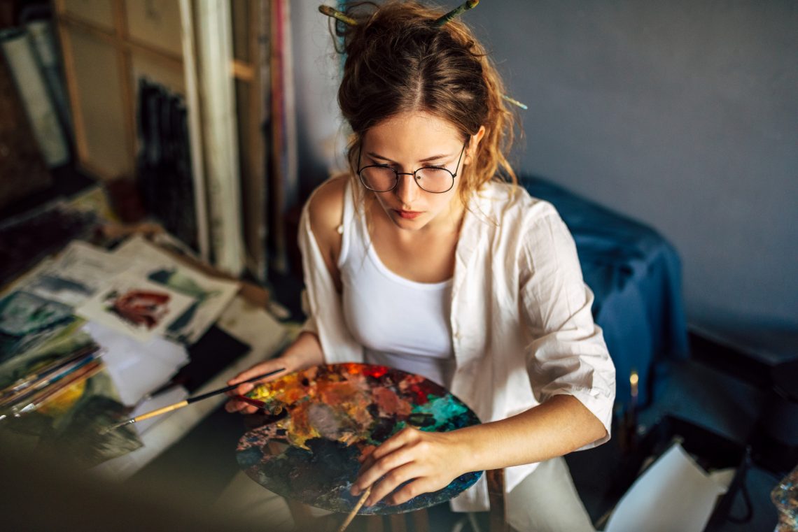 Young woman painting stock photo