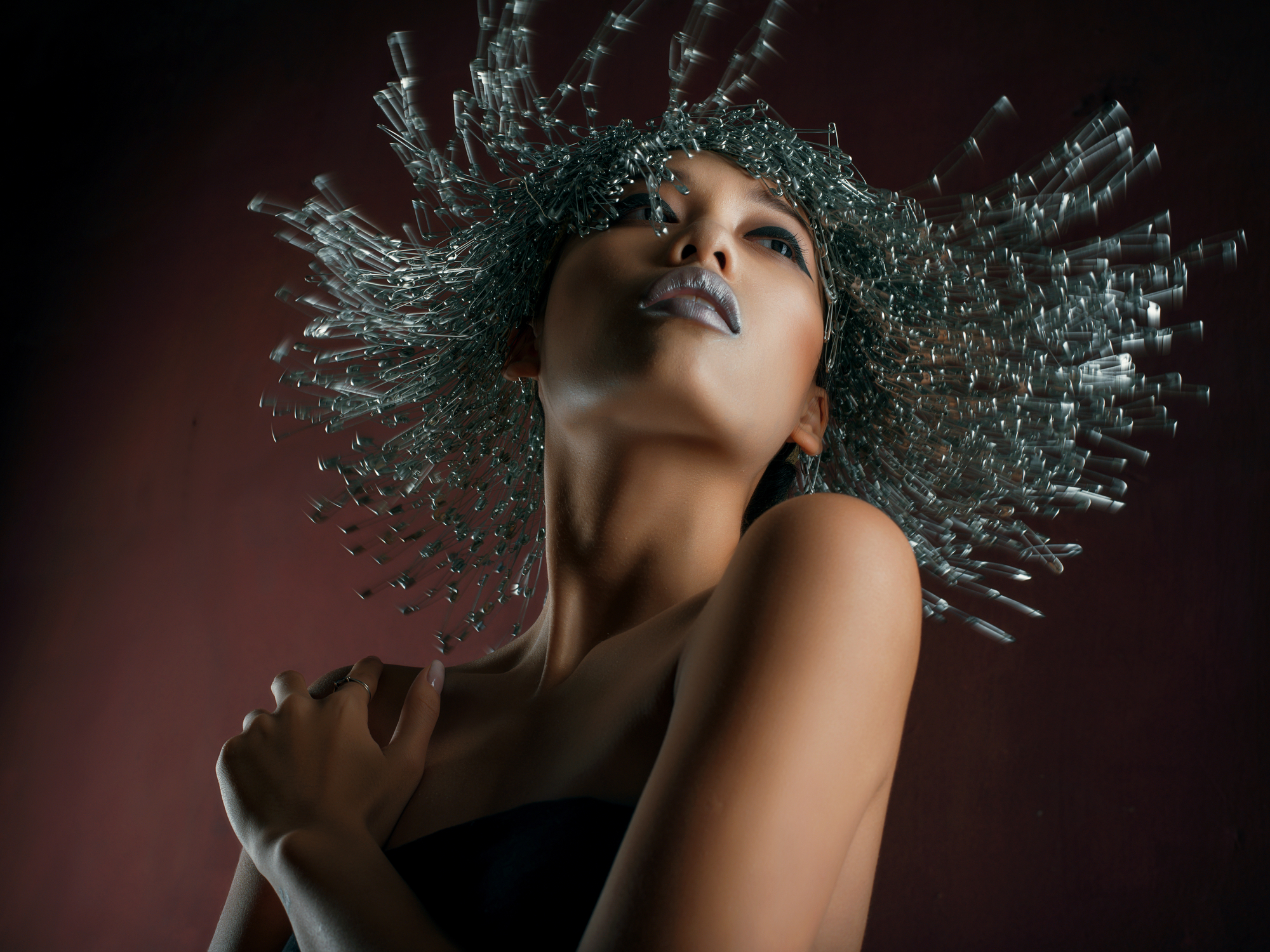 Motion portrait of model with pin wig and silver lips