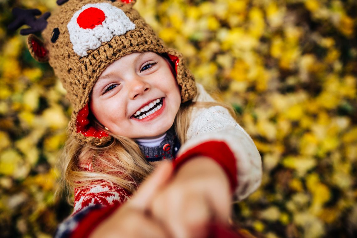 girl smile in camera in autumn