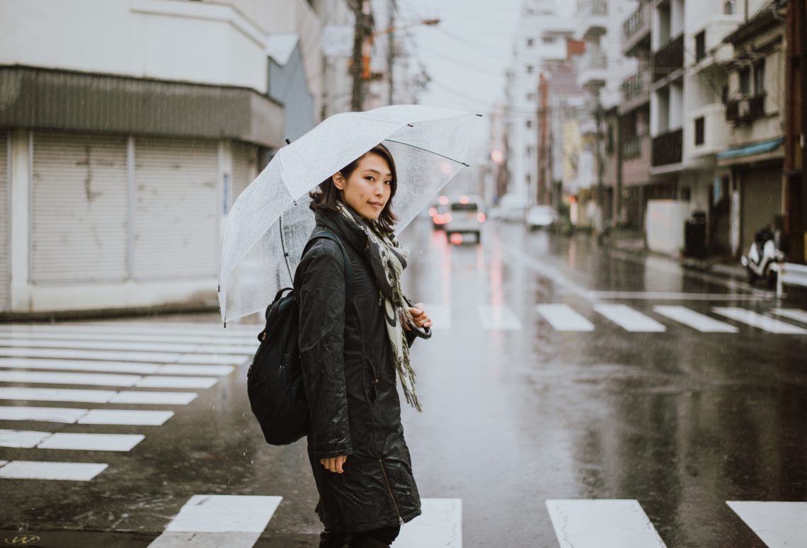 Beautiful japanese woman crosses street
