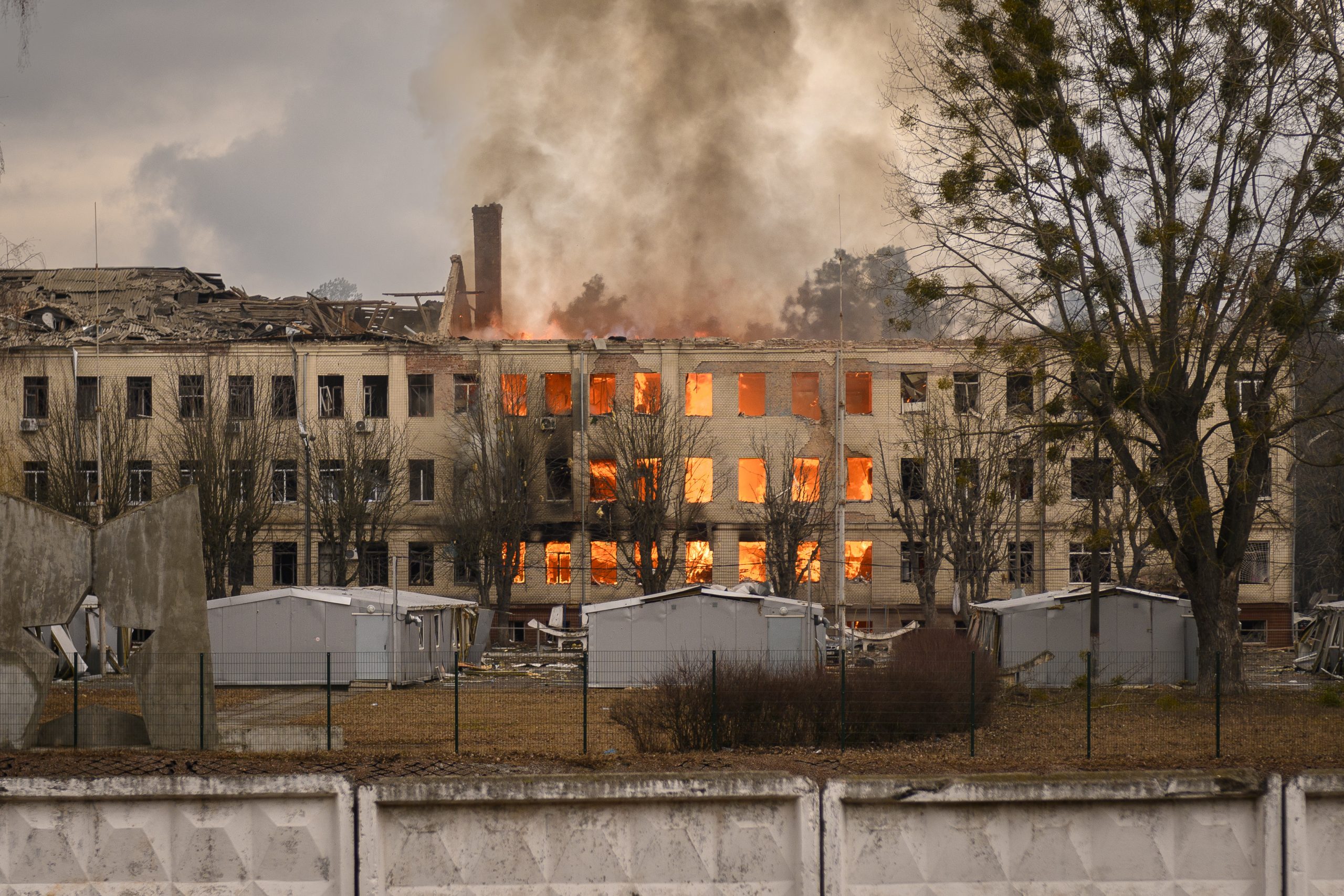 Photo of a building in Brovary burns after being hit by a Russian rocket 