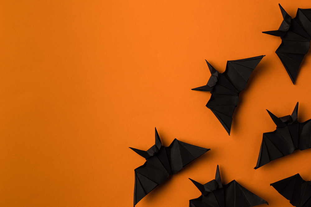 Графіка 3D-кажани на помаранчевому фоні