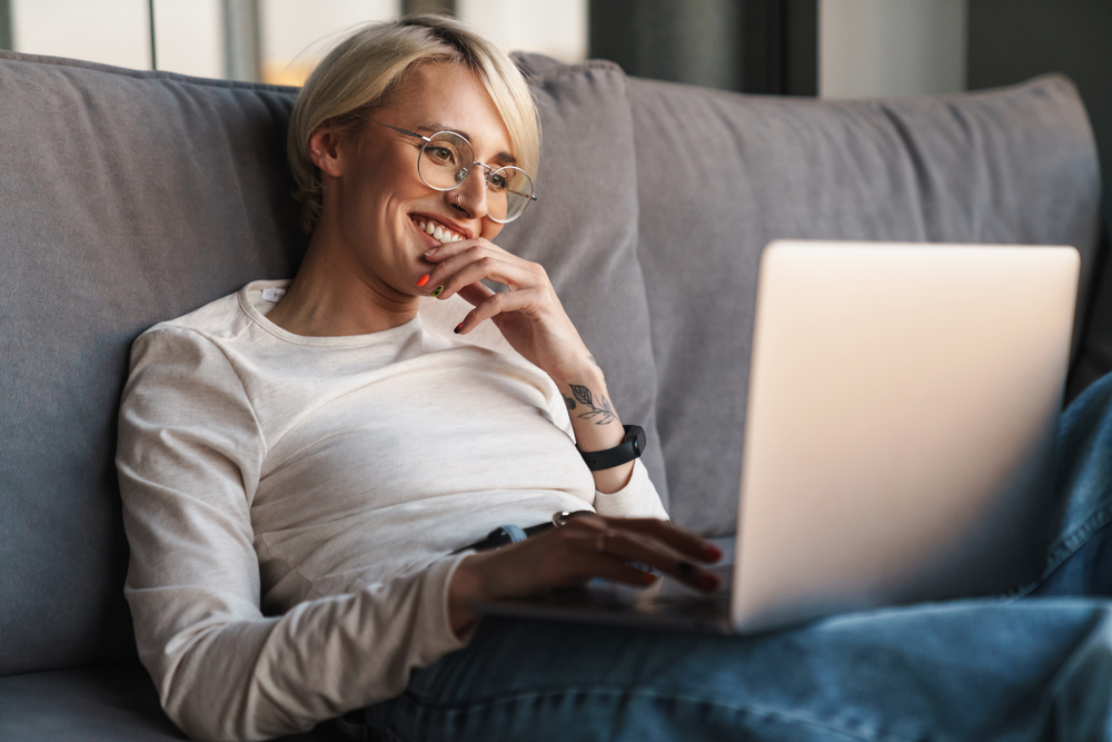 Smiling woman working online