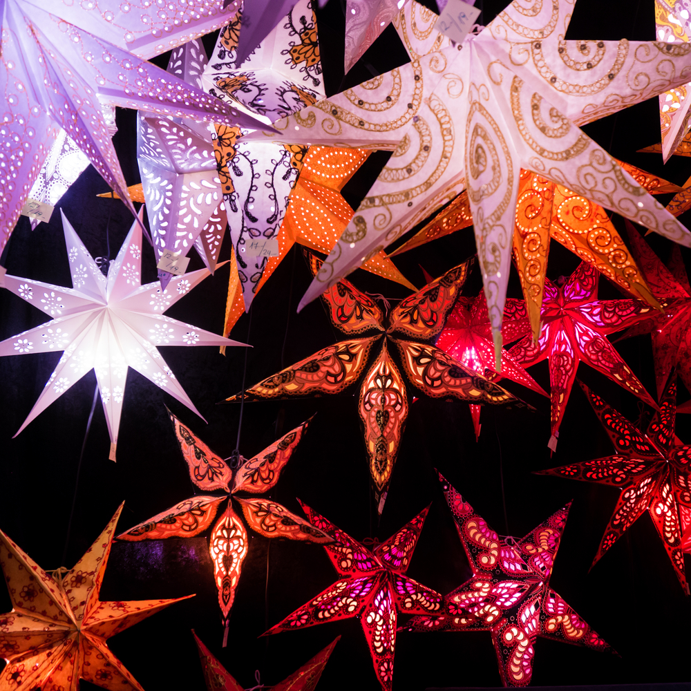 Colorful Christmas stars.  A background of star lanterns.